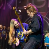 Lemoore High's Taelei Stinger with bass player Jeff Pilson